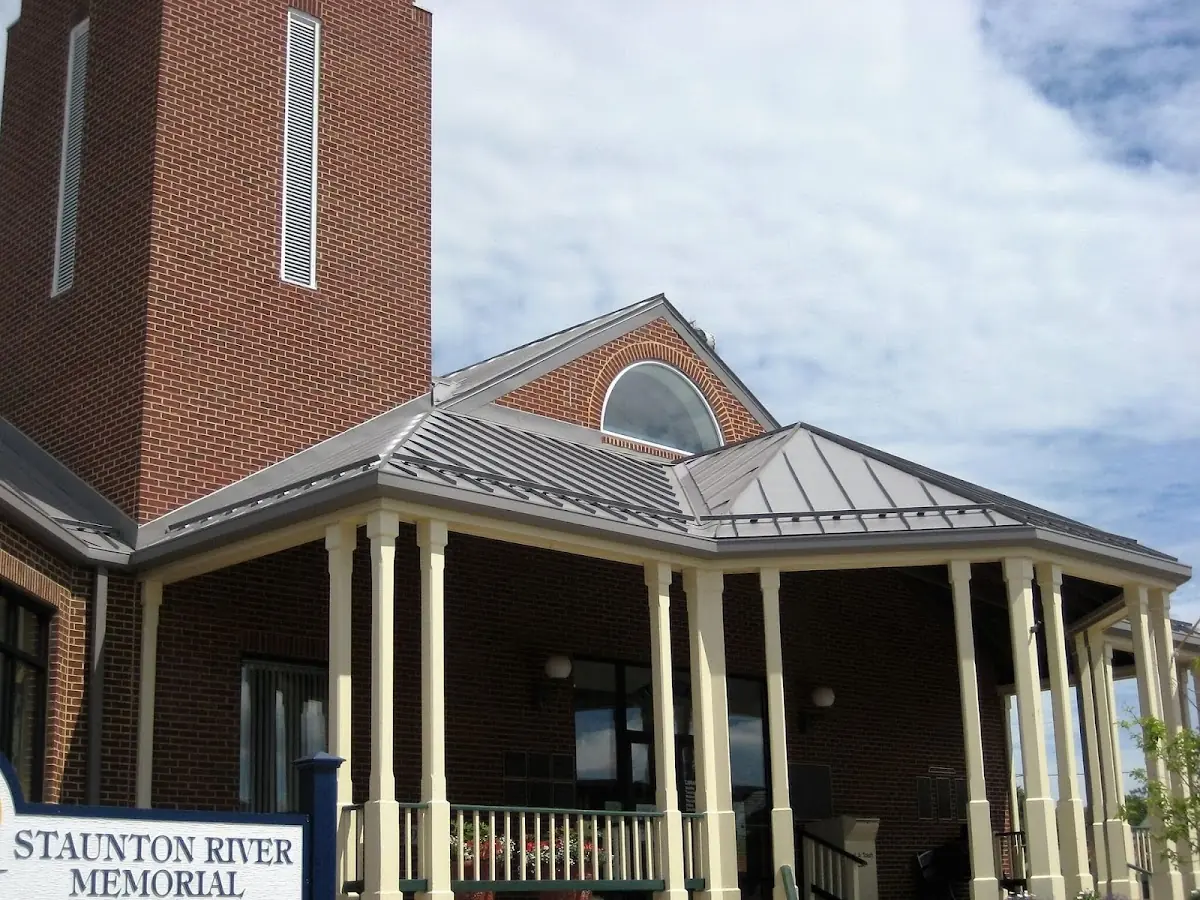 Skilled roofing craftsmen working on a residential roof in Mars Hill